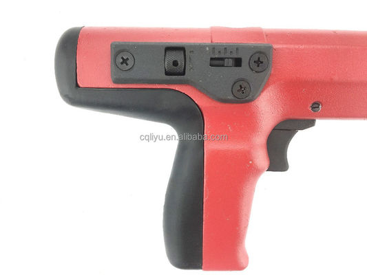 Pistolet à clous décoratif pour tapisseries rouges avec charges de poudre à bande et clous en béton durables